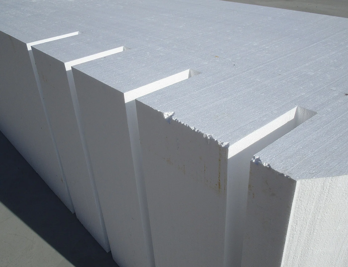 Bulk EPS blocks ready for size reduction at recycling crusher